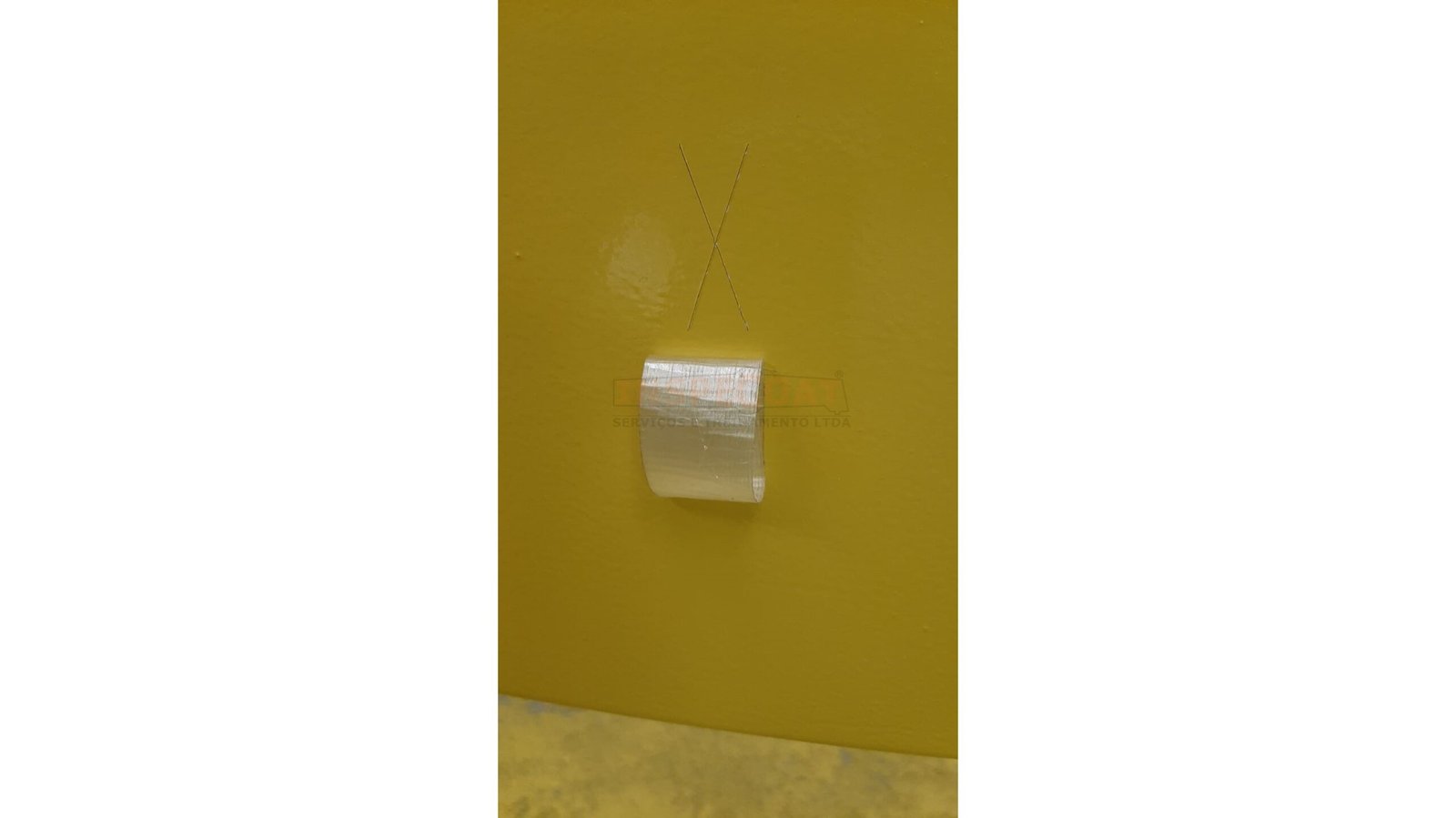 Teste de aderência por corte em X